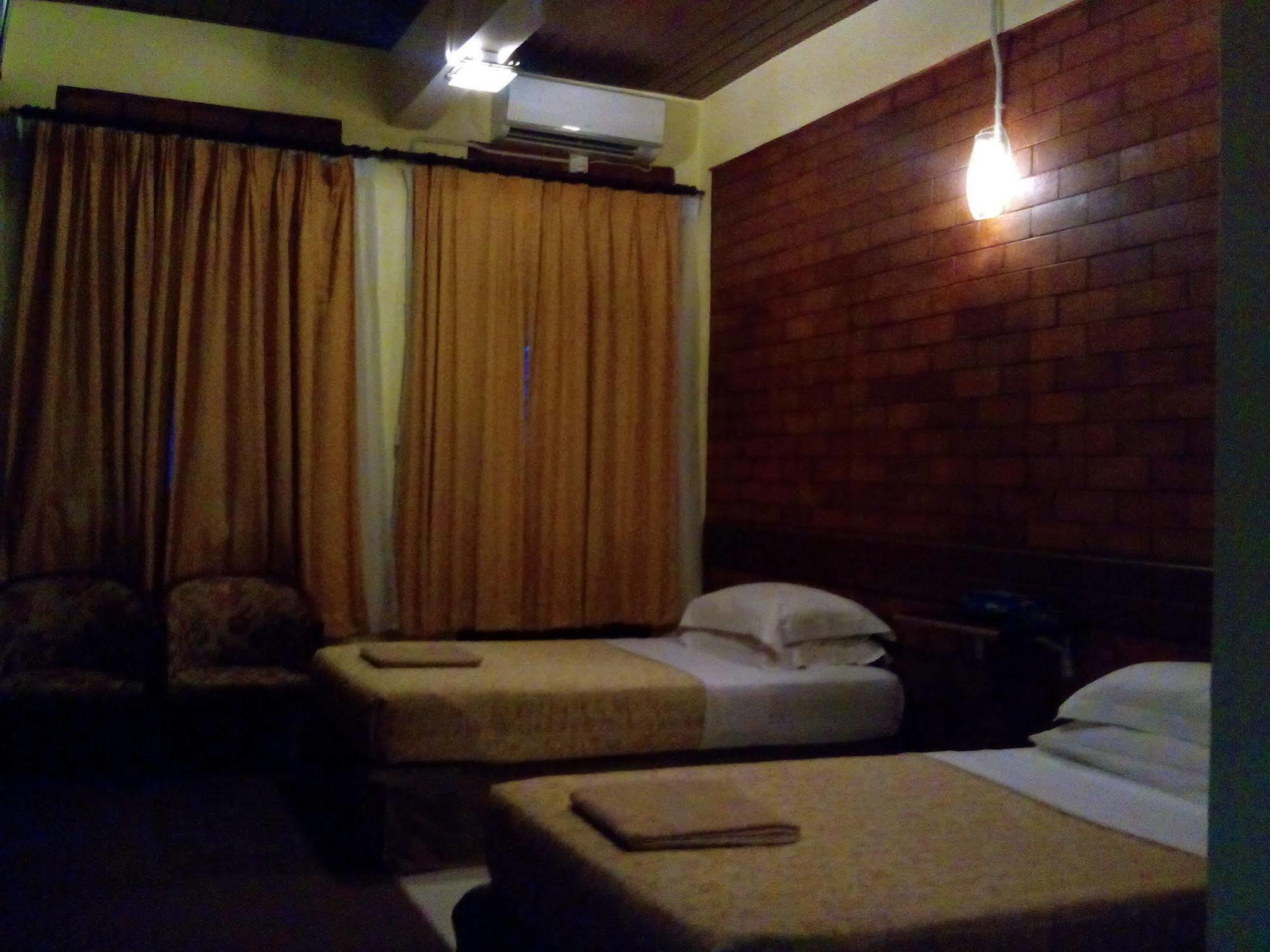 Al Inshirah Inn Кота-Бару Экстерьер фото